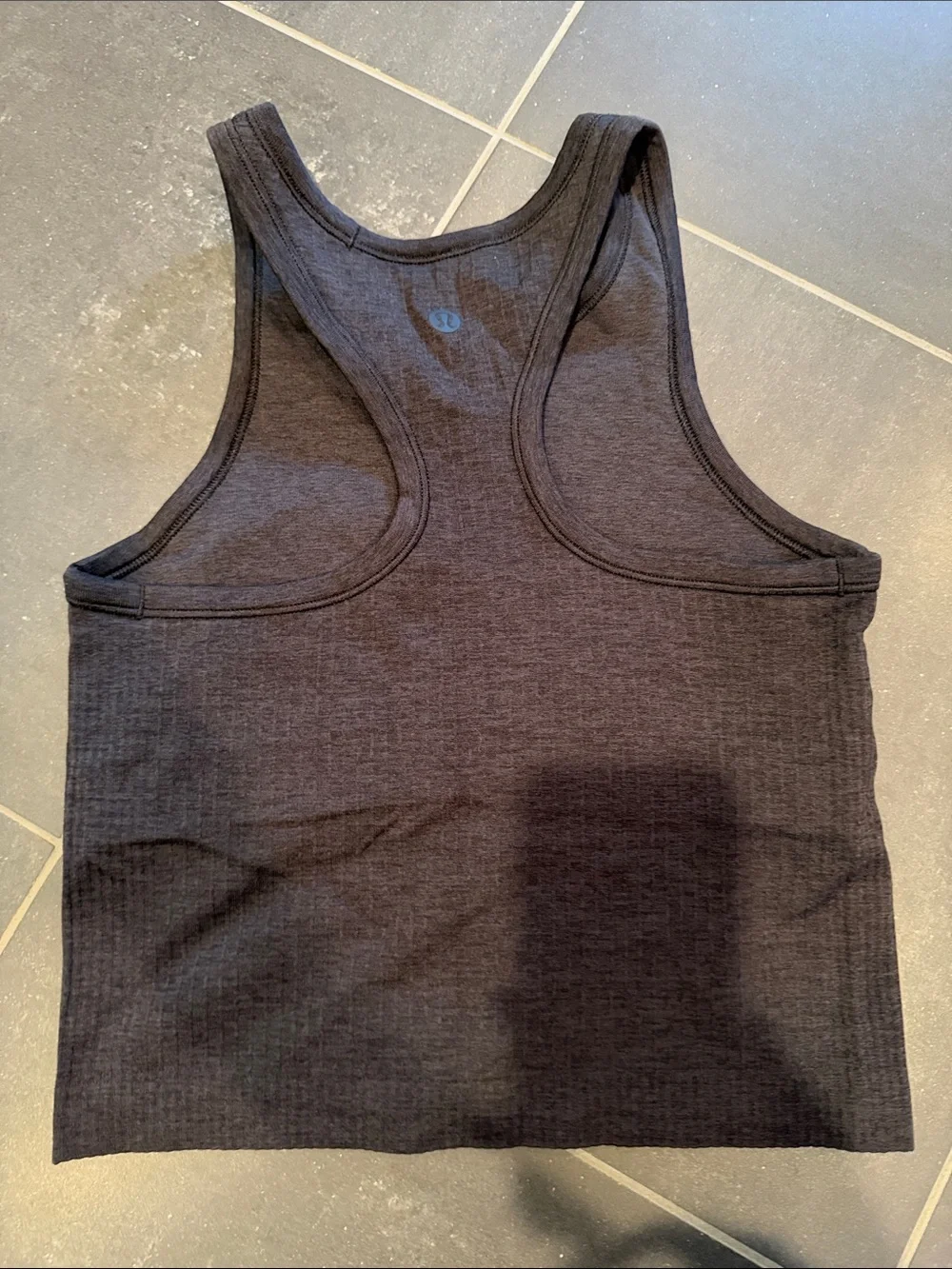 Lululemon black Ebb to Street Cropped Racerback Tank Top Light Support size 4
